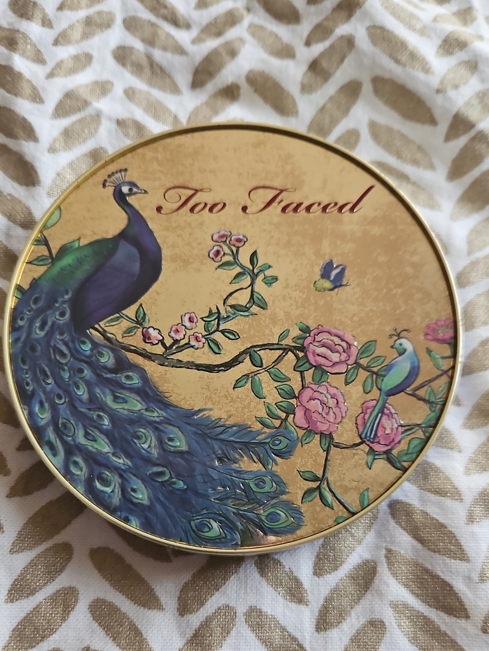 Too Faced Gold Compact with Blue-Green Peacock and Pink Flowers